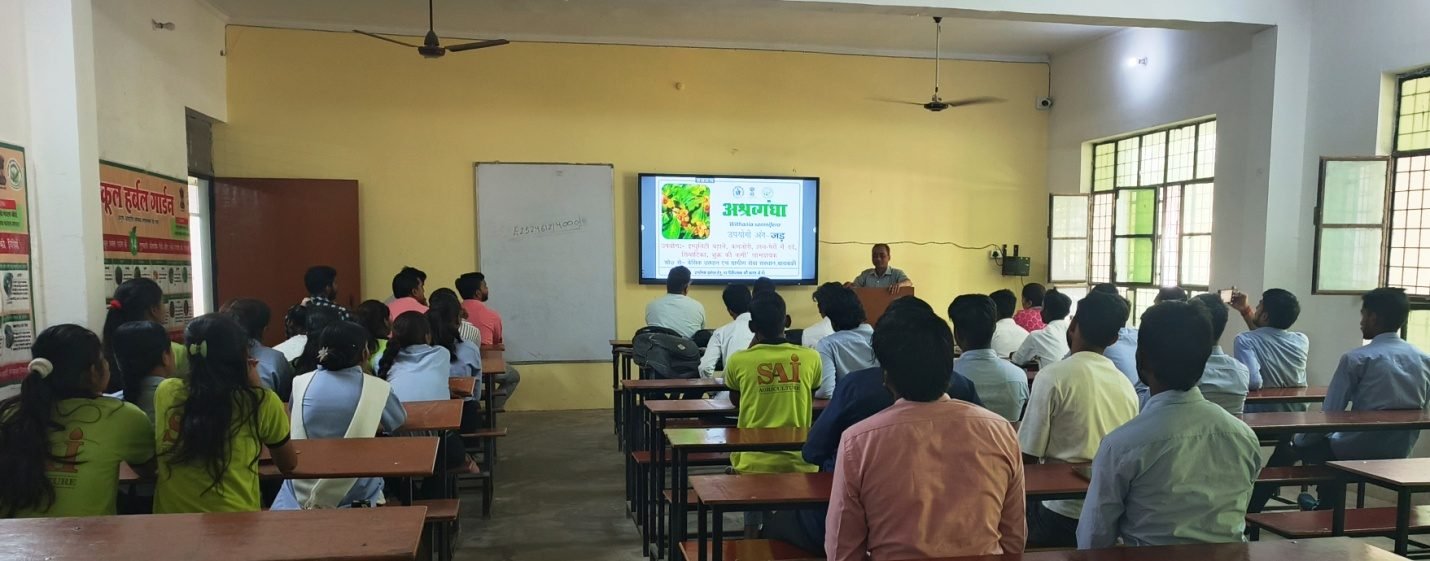 Students and faculty at a School Herbal Garden awareness session